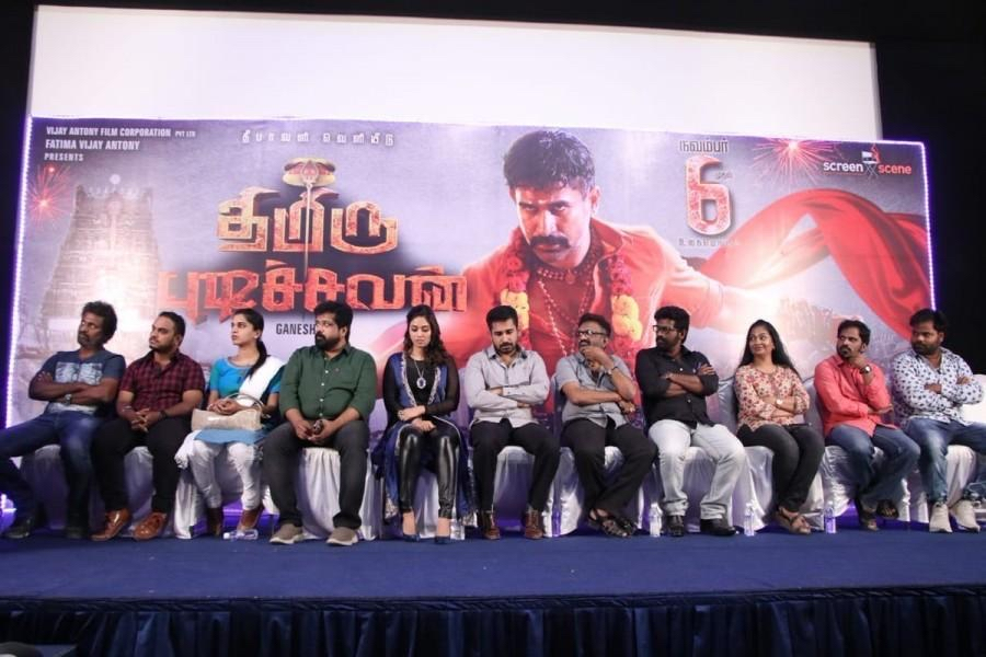 Press meet for a Tamil film with cast and crew