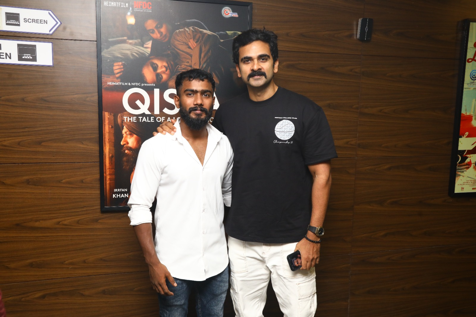 Karthi greeting fans at a film promotional event